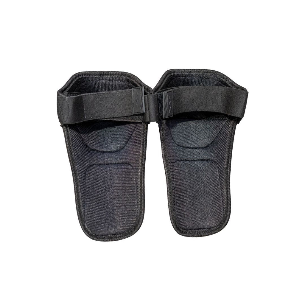 Mercian Penalty Corner Knee Pads rear view showing cushioned foam backing, adjustable elastic straps and lightweight ergonomic construction for secure comfort during defensive play.